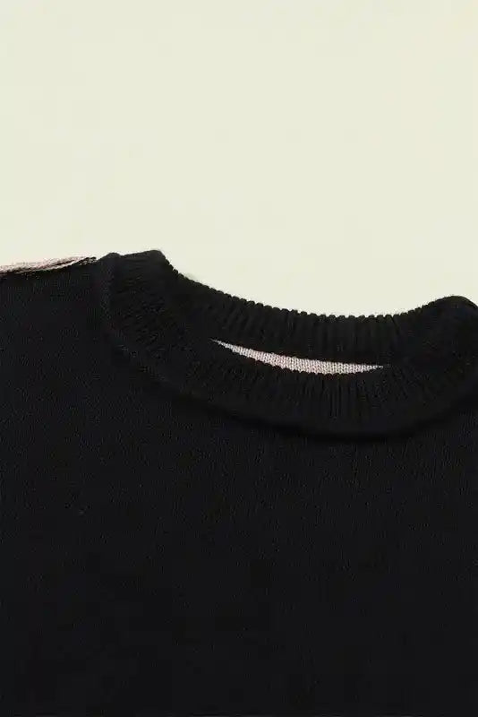 Close-up of ribbed neckline on Coffee Leopard Print Colorblock Pullover Sweater - New, showcasing fine knit texture in black.