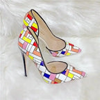 Side view of Prism Clash Court Heels with bold chequered pattern and high stiletto heel, ideal for stylish evening wear.