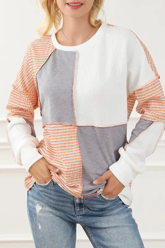 Colorblock oversized knit top - red sandalwood exposed seam - long sleeve tops