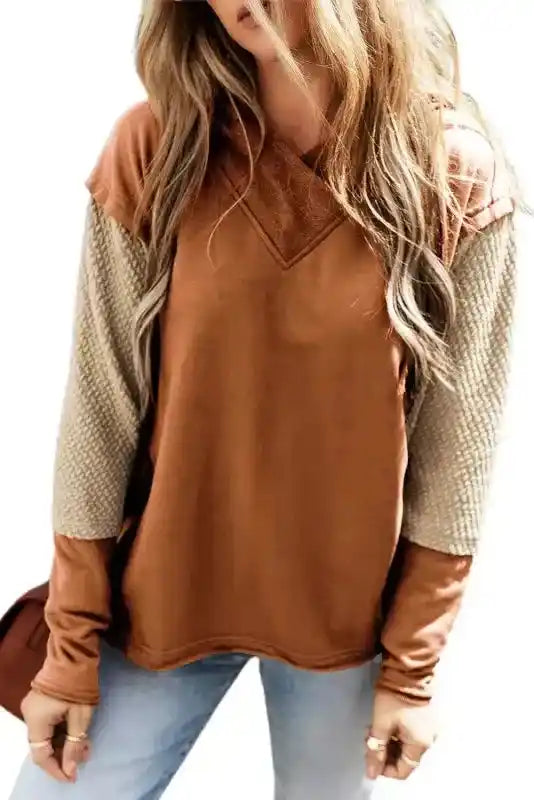 Brown Contrast Patchwork Hoodie on white background, highlighting colorblock sleeve detail and relaxed fit.