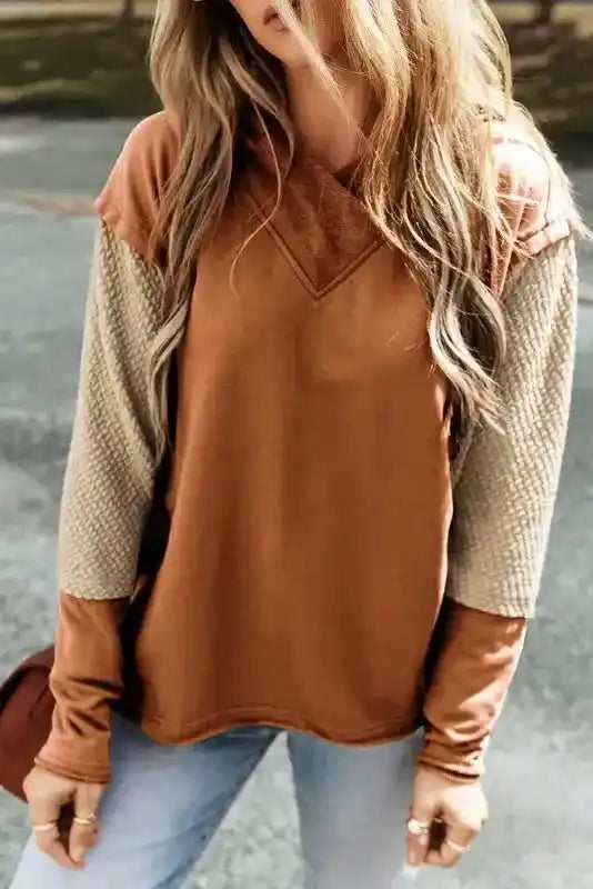 Brown Contrast Patchwork Hoodie with beige sleeves, casual and trendy for autumn fashion lovers.