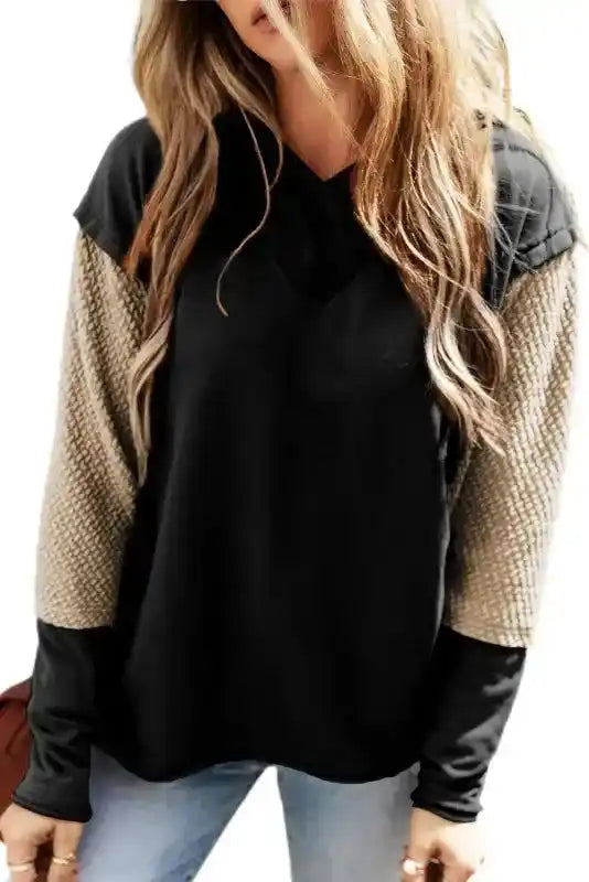 Black Contrast Patchwork Hoodie with beige sleeves on white background, highlighting trendy colorblock design.