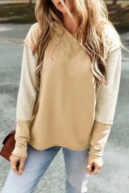 Beige Contrast Patchwork Hoodie with light textured sleeves, ideal for a soft and cozy casual fall style.