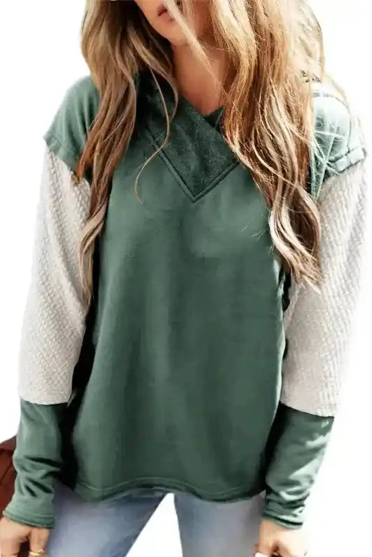Green Contrast Patchwork Hoodie with beige sleeves on white background, showcasing trendy fall fashion.