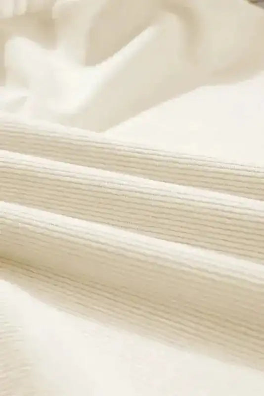 Close-up of Corduroy Ruffle Blouse showing soft ribbed corduroy texture and feminine ruffle detail — Fashionfitz