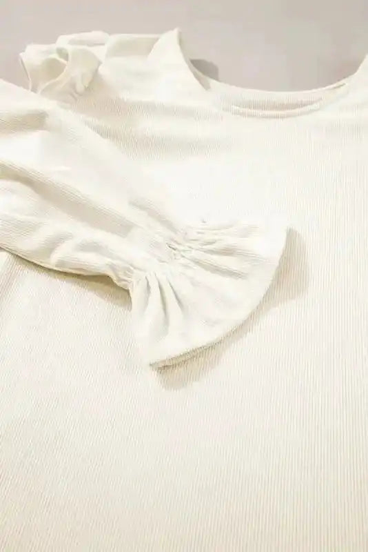 Side view of Corduroy Ruffle Blouse showing textured corduroy fabric and round neckline — Fashionfitz