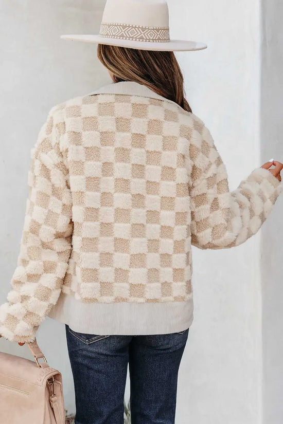 Back view of a Person wearing a Corduroy Sherpa Jacket with a neutral background
