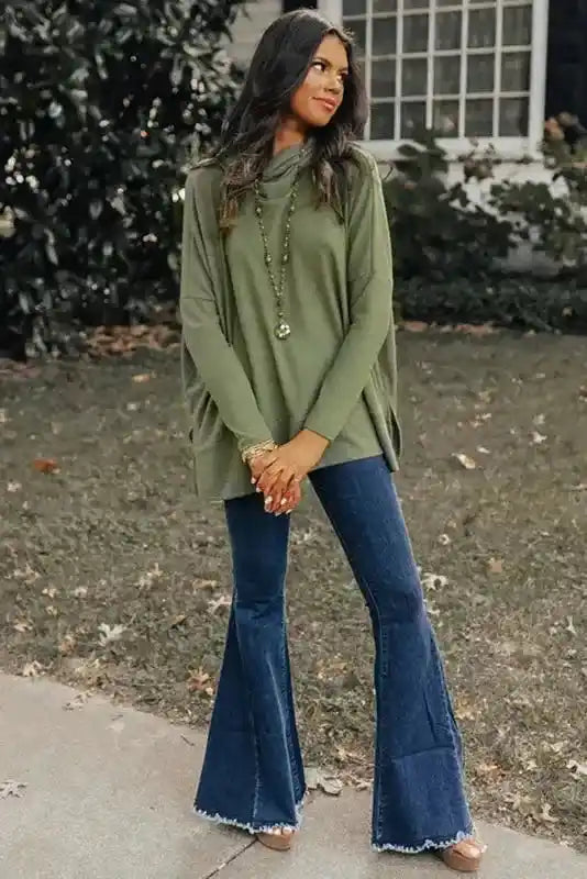 Full outfit featuring the olive green Cowl Neck Shift Tunic Top paired with flared jeans, showcasing a comfy and stylish daily essential.