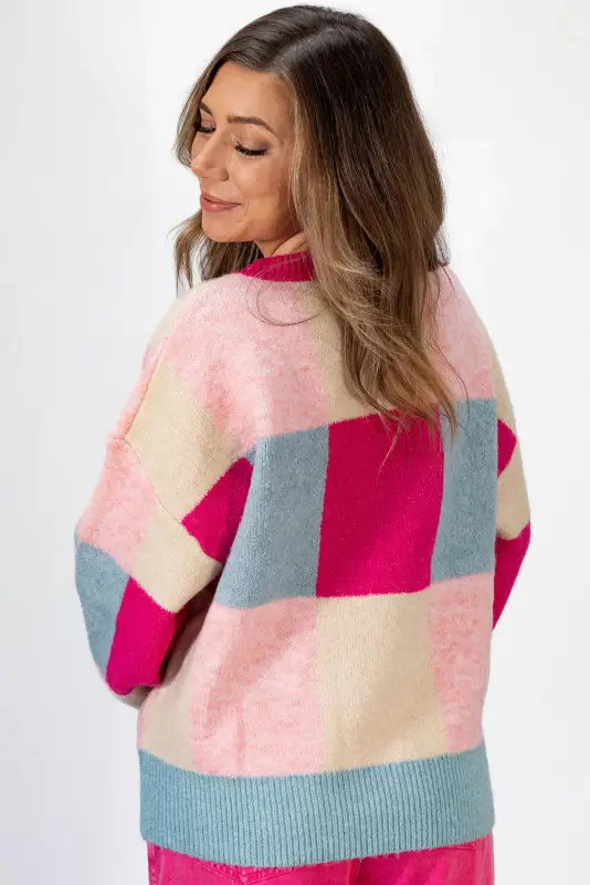 Crimson cascade: color block crewneck sweater