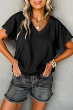 Stylish Crinkled V-Neck T-Shirt in black with wide sleeves, paired with denim shorts for a casual summer look.