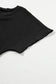 Close-up of black crinkled v neck wide sleeve t-shirt, textured fabric for a relax relax style