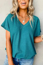 Teal Crinkled V-Neck T-Shirt with wide sleeves, styled with jeans for a fresh and comfortable summer outfit.