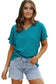 Woman in denim shorts and teal tee styled for relax relax crinkled v neck fashion