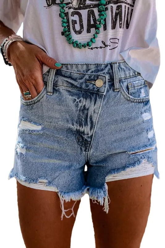 Crossover waist denim shorts - relaxed, distressed denim with frayed edges and rips