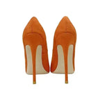 Back view of Classic Suede High Heels by FashionFitz, showcasing slim stiletto heels in orange suede for a sleek, elegant look.