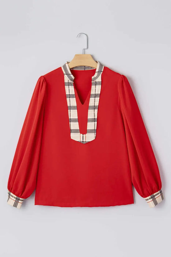 Red Tartan Fusion V‑Neck Blouse on hanger, highlighting check trim and long sleeves, ideal for feminine and office styling.