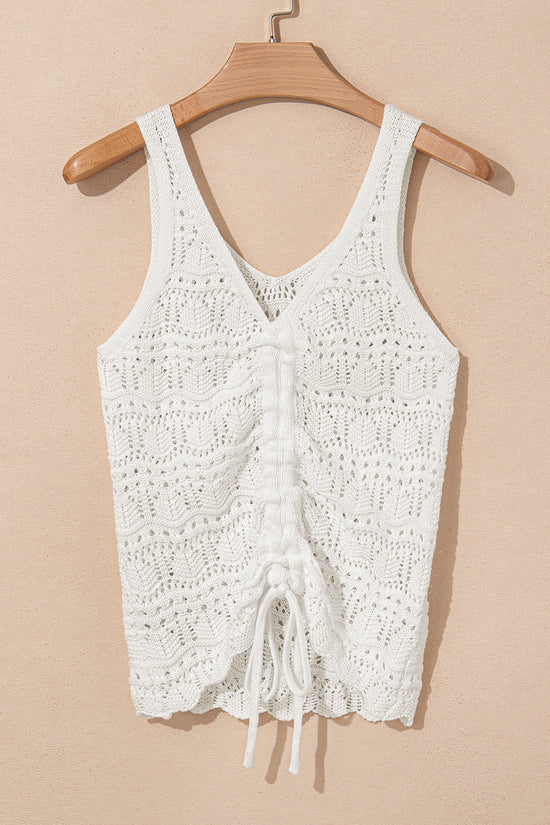 Flat lay of glamour crochet tank top on hanger, featuring breathable knit texture and adjustable drawstring for versatile summer styling.