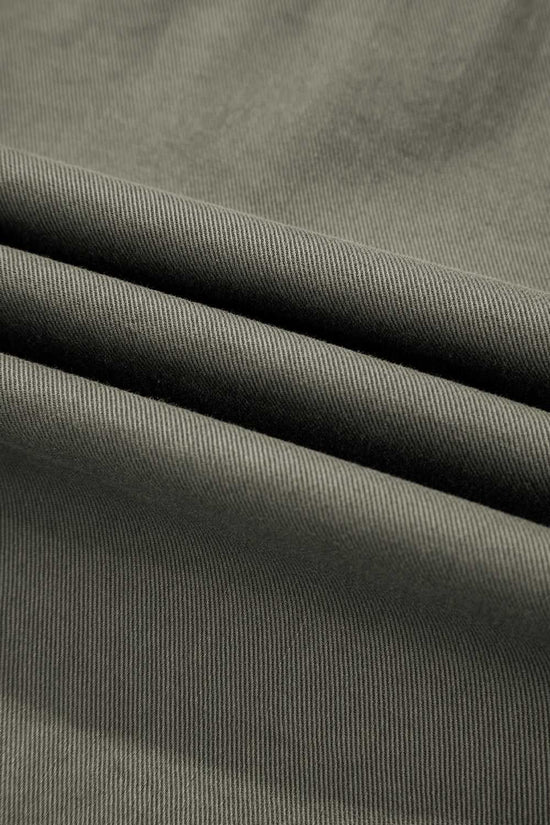 Fabric detail of Green Bay Ruffled Denim Vest - Women's Fashion Trends showing durable green denim texture ideal for fall outerwear.