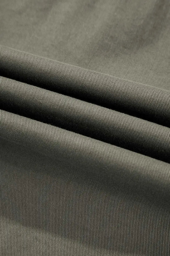 Fabric detail of Green Bay Ruffled Denim Vest - Women's Fashion Trends showing durable green denim texture ideal for fall outerwear.