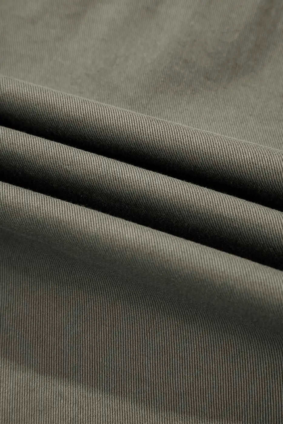 Fabric detail of Green Bay Ruffled Denim Vest - Women's Fashion Trends showing durable green denim texture ideal for fall outerwear.