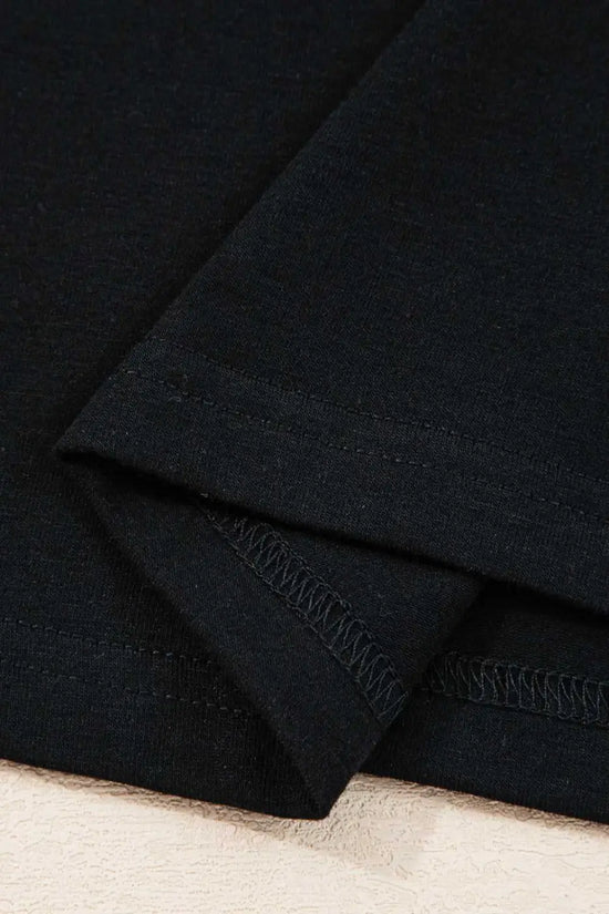 Hemline stitching detail of the Lace Sleeve Drop T-Shirt - Soft & Comfy | FashionFitz, featuring double-stitched black fabric for durability.