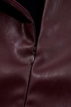 Close-up of zipper on Brown Faux Leather Sleeveless Mini Dress highlighting the high-quality PU leather material and stitching.