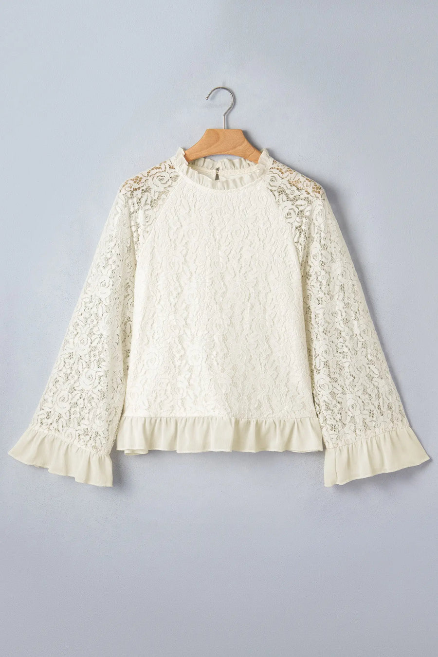 Women's lace ruffle trim blouse flat lay casual