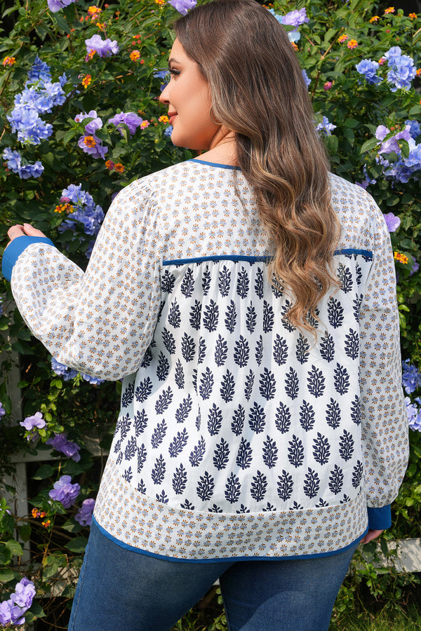 Side view showing puff sleeve detail on boho floral plus size blouse