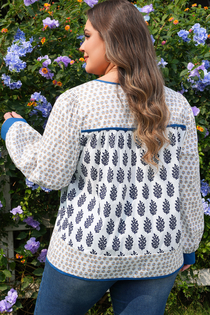 Side view showing puff sleeve detail on boho floral plus size blouse