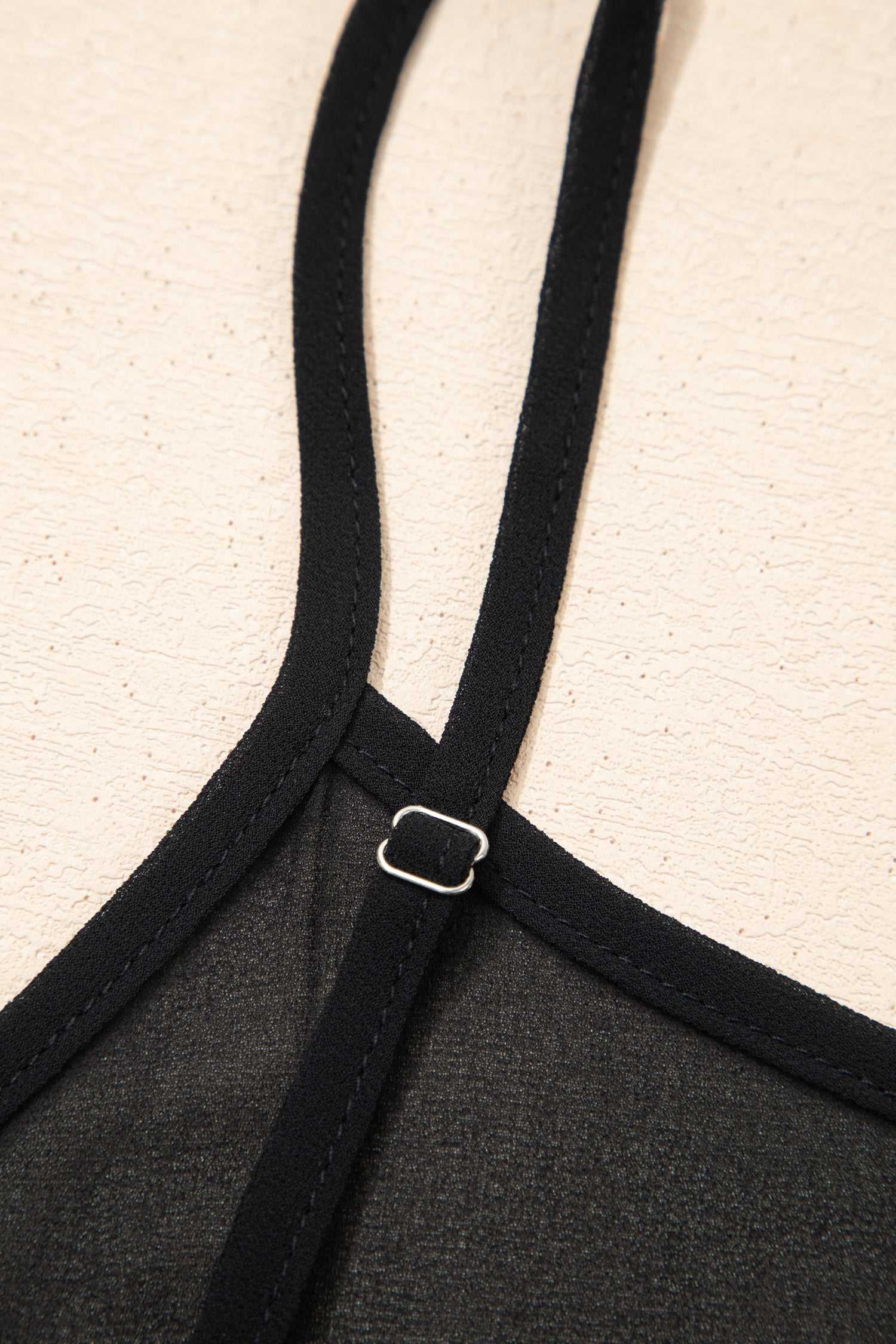 Adjustable strap detail of Black Floral Sleeveless Maxi Dress for a customizable fit and added comfort in summer styling.