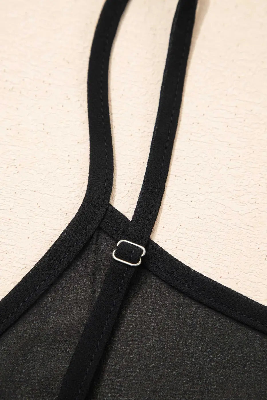 Adjustable strap detail of Black Floral Sleeveless Maxi Dress for a customizable fit and added comfort in summer styling.