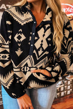Women's Black Plus Size Aztec Print Plush Sweatshirt styled with jeans, featuring a cozy sherpa fleece texture and bold Western pattern.