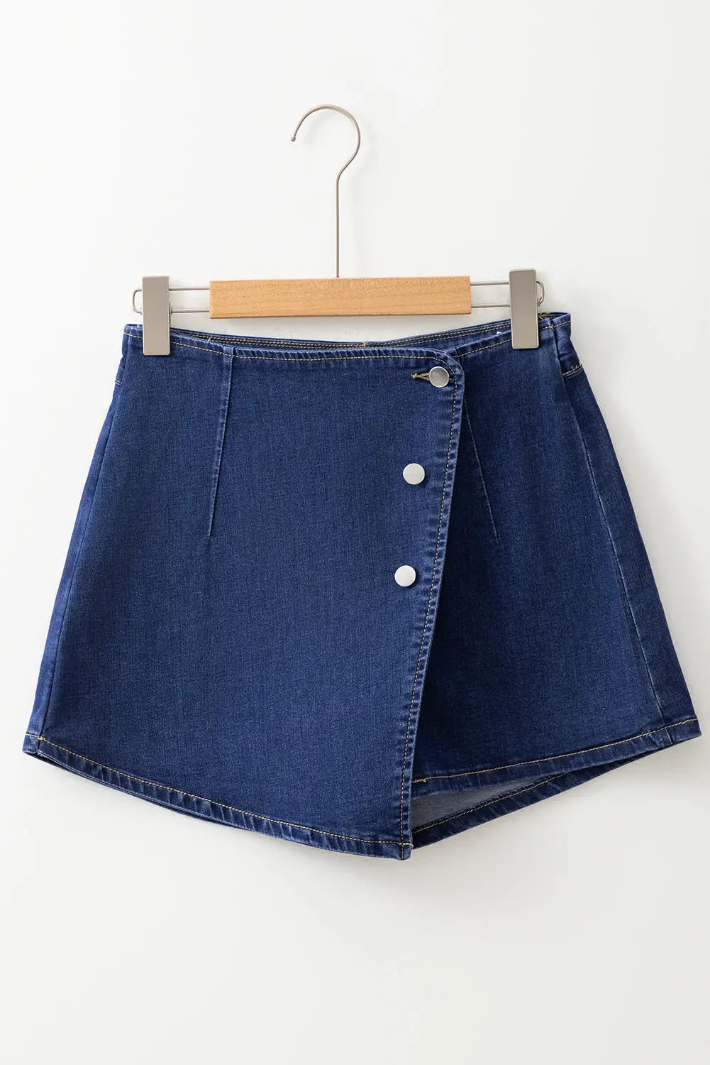 Bluing asymmetric wrapped buttoned high waist denim shorts