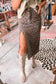 Model wearing Leopard Denim Midi Skirt - Summer Fashion by FashionFitz with high slit and western boots, styled for casual chic.