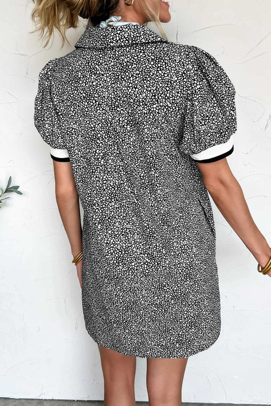 Back view of Black Leopard Polo Short-Sleeve Dress featuring puff sleeves and H-line silhouette. Comfortable and chic for casual summer occasions.