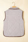 Back view of the Stripe Snap Winter Vest on hanger, highlighting quilted design and striped fabric for added warmth and texture.