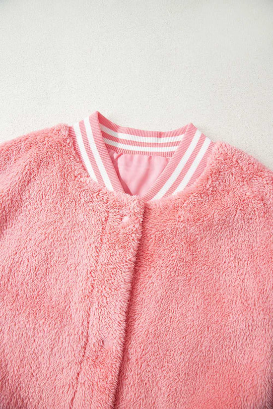 Close-up of plush sherpa texture in varsity pink