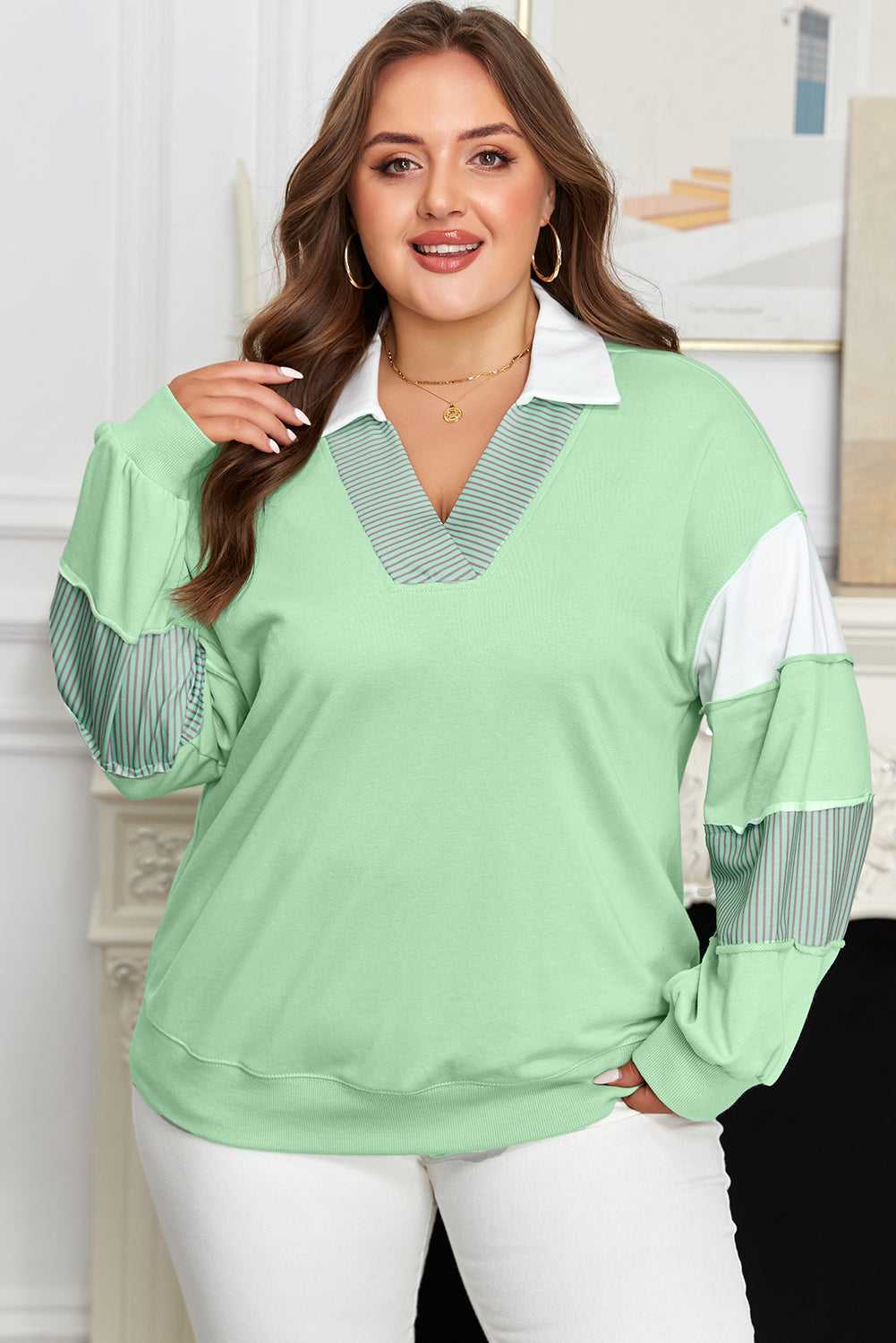 Curve Jade Stripe V‑Neck Sweatshirt for Women with white collar and striped sleeve accents, styled for plus size casual wear.