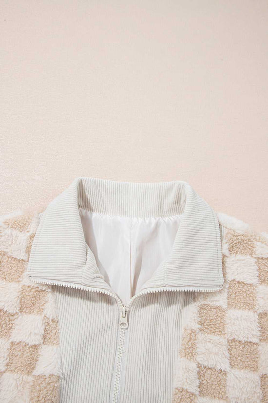 Light green corduroy jacket with a checkered pattern on a beige background