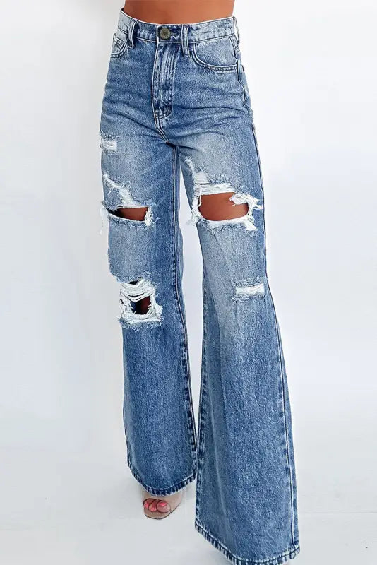 Distressed elegance wide-leg jeans – relaxed, distressed wide-leg blue jeans with ripped knees