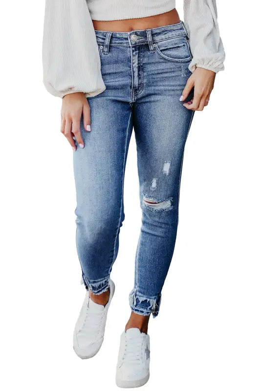 Light blue distressed frayed ankle skinny jeans