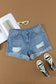 Distressed ripped denim shorts with rolled hem - perfect for a relax relax summer look