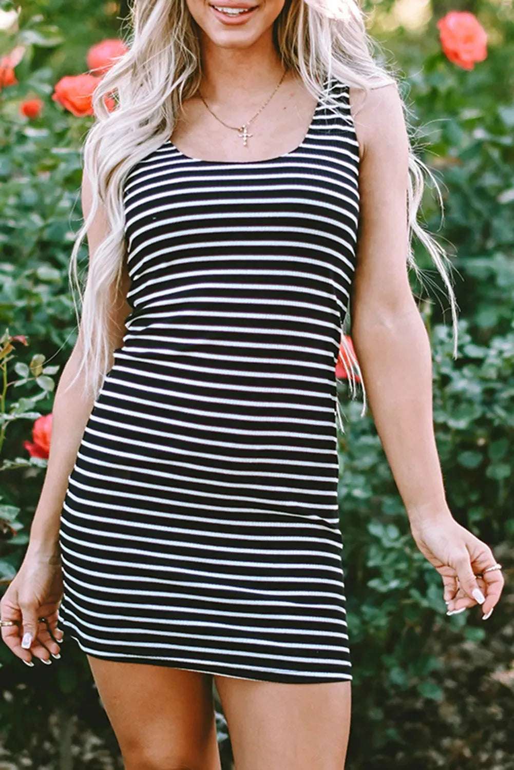 Dresses Black Stripe Ribbed Knit Sleeveless Mini Dress from FashionFitz, featuring a bodycon silhouette and casual stripe print for daily wear.