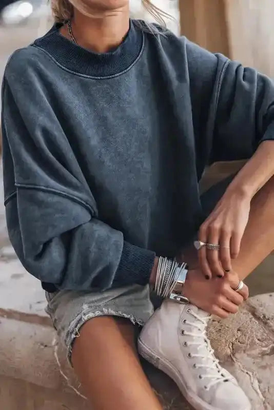 Casual Drop Shoulder Crew Neck Sweatshirt paired with white sneakers and stacked bracelets for a laid-back look.