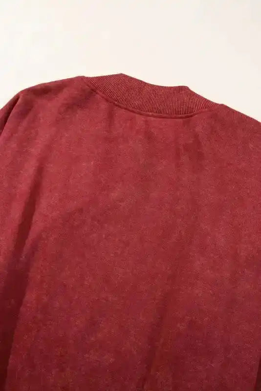 Back neckline detail of red Drop Shoulder Crew Neck Sweatshirt, showcasing ribbed collar and washed finish.