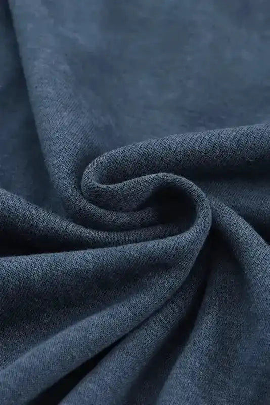 Detailed fabric view of Cozy Drop Shoulder Crew Neck Sweatshirt in navy, showcasing soft, cozy material ideal for winter wear.