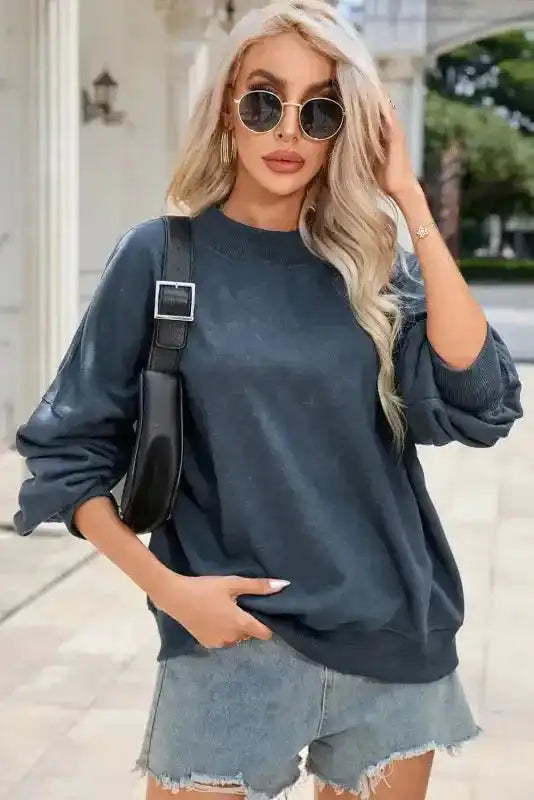 Stylish Drop Shoulder Crew Neck Sweatshirt paired with sunglasses and a shoulder bag, perfect for daily casual wear.