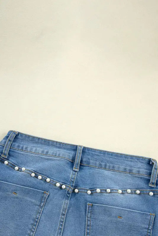 Dusk blue pearl boot cut denim jeans