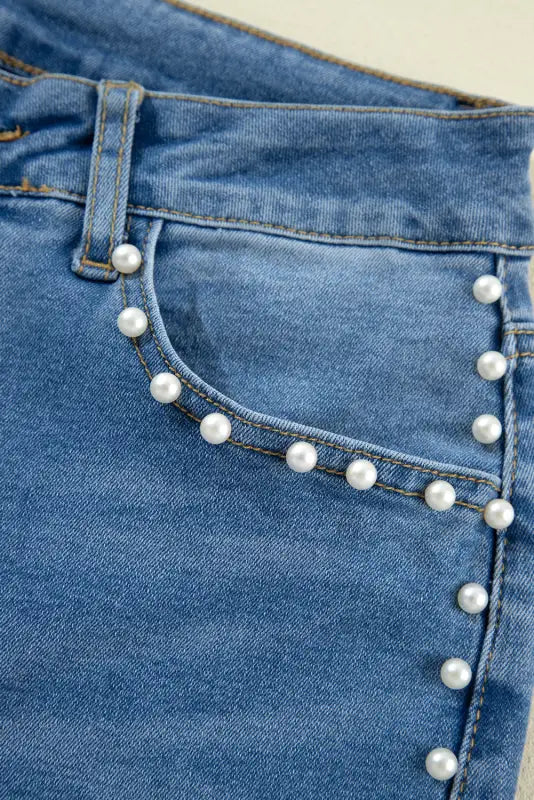 Dusk blue pearl boot cut denim jeans