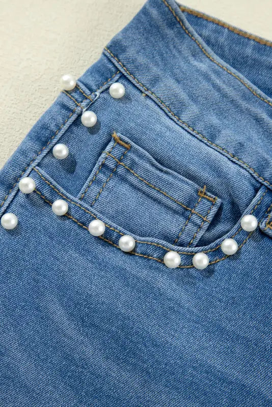 Dusk blue pearl boot cut denim jeans